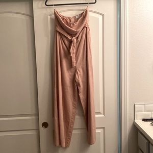 Large blush colored jumpsuit with cutout